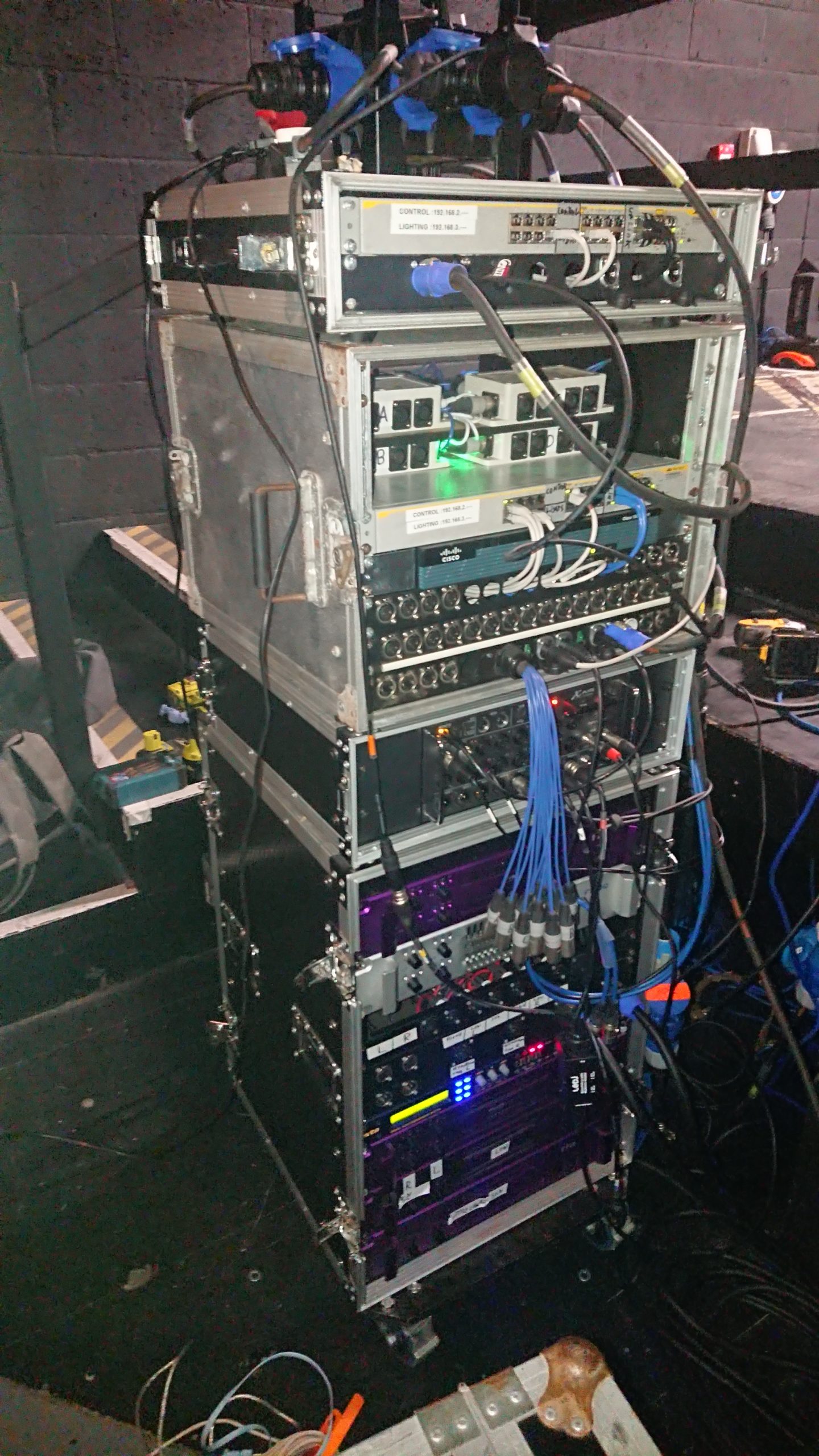 Main amp rack with back of stage data network cisco. front of house rack on top